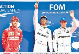  ??  ?? Lewis Hamilton junto al alemán Sebastian Vettel y el finlandés Valtery Bottas.
