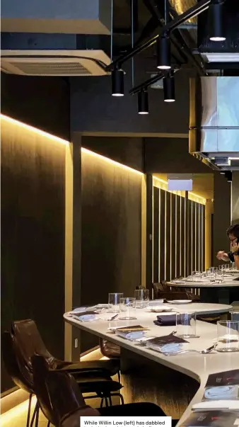  ??  ?? While Willin Low (left) has dabbled in designing plates and chef’s whites, his eye for design is best appreciate­d at French restaurant Lerouy’s new home that boasts a modern yet elegant space