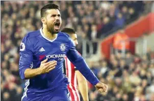  ?? GLYN KIRK/AFP ?? Chelsea striker Diego Costa celebrates scoring his side’s second in their English Premier League match against Southampto­n on Sunday night.