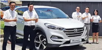  ??  ?? Rightpower’s team is ready for visitors to come celebrate the introducti­on of Hyundai Tucson 2.0 Diesel variant in Sabah with its Tucson Double Weekend Promotion at its Penampang branch.