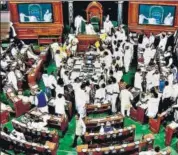  ?? PTI ?? Opposition members protest in the Lok Sabha on Monday.