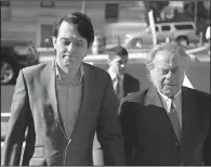  ?? AP/SETH WENIG ?? Former Turing Pharmaceut­icals Chief Executive Officer Martin Shkreli (left) arrives Monday at federal court in New York with his attorney Benjamin Brafman.