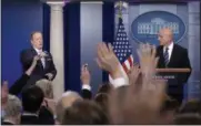  ?? THE ASSOCIATED PRESS ?? White House press secretary Sean Spicer, left, calls on a reporter as National Security Adviser H.R. McMaster listens at right during a briefing at the White House in Washington on Tuesday,.