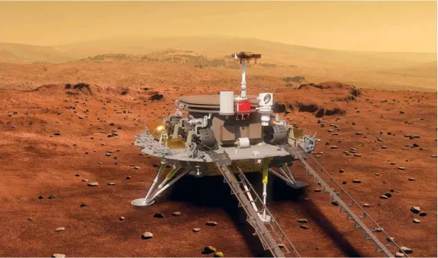  ?? Associated Press ?? ↑
An artist’s rendering shows a concept design for the Chinese Mars 2020 rover and lander.