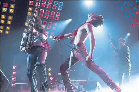  ?? TWENTIETH CENTURY FOX ?? Gwilym Lee (as guitarist Brian May), left, and Rami Malek (as singer Freddie Mercury) star in “Bohemian Rhapsody.”