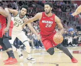  ?? LYNNE SLADKY/AP FILE PHOTO ?? Justise Winslow, above, has started at power forward this season, but not in the backcourt. He says he can make the transition if necessary.