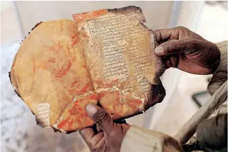  ?? | REUTERS ?? THE ancient Timbuktu manuscript­s of Mali are back in the headlines following Google’s initiative to host a collection of them in an online gallery. The images of the texts in Arabic can be found at a page called ‘Mali Magic’.