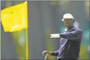  ?? MATT SLOCUM/AP ?? VIJAY SINGH, FIJI, lines up a putt on the third hole during third round at the Masters tournament at Augusta National Golf Club on Saturday in Augusta, Ga.