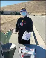  ?? COURTESY OF ADVENTIST HEALTH ?? A staff member at Adventist Health Tehachapi Valley assists during a recent vaccinatio­n clinic held at the hospital, 1100 Magellan Drive.