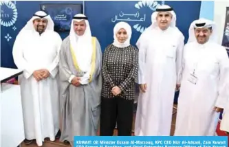  ??  ?? KUWAIT: Oil Minister Essam Al-Marzouq, KPC CEO Nizr Al-Adsani, Zain Kuwait CEO Eaman Al-Roudhan, and Chief Enterprise Business Officer of Zain Kuwait Hamad Al-Marzouq pose for a picture at Zain’s booth.