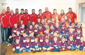  ??  ?? Dundee West coaches are pictured with the club’s latest intake of 6-8-year-olds.