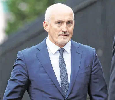  ?? PHOTO: STEPHEN DAVISON ?? ‘Hero’:
Boxing manager and former world champion Barry McGuigan arrives at Belfast High Court yesterday.