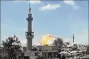  ?? ARMY OF ISLAM ?? Flames rise from a Syrian government airstrike attack Friday in eastern Ghouta, a suburb of Damascus, Syria, in a frame grab from video provided by Syrian rebels’ Army of Islam media outlet.