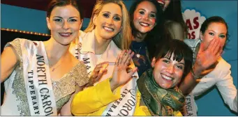  ??  ?? The wind and rain did not dampen the smiles on this lovely bunch of roses during Saturday night’s Rose parade in Tralee. Photp: John Cleary.