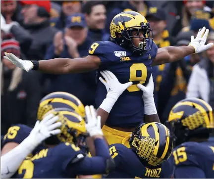  ?? ASSOCIATED PRESS FILE PHOTO ?? Michigan wide receiver Donovan Peoples-Jones (9) celebrates his 25-yard touchdown reception against Ohio State during a 2019 game in Ann Arbor.