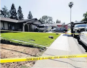  ??  ?? PROBE Crime scene tape surrounds Sacramento house belonging to pensioner DeAngelo