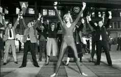  ??  ?? From left: Diana at Waterloo station in 1983, where she encouraged commuters to work out with her, and with the Mudeford Lifeboat Crew in 1989. Below: Diana (centre) on ITV’s Loose Women in March