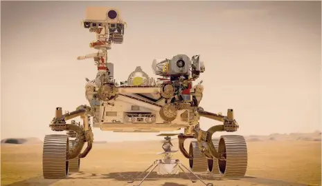  ??  ?? Tra perseveran­za e ingegnosit­à.
Un’immagine del rover Perseveran­ce della Nasa con davanti l’elicottero marziano Ingenuity in un rendering sul suolo di Marte