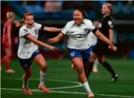  ?? SOPHIE RALP/ASSOCIATED PRESS ?? Lauren James (right) is fired up after firing England into the lead vs. Denmark.