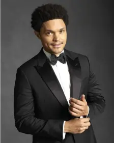  ?? CBs ?? BACK AGAIN: Trevor Noah hosts the 64th Annual Grammy Awards, airing tonight on CBS and streaming on Paramount+. Noah also hosted last year’s Grammy Awards.