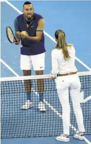  ?? (Photo: AFP) ?? Australia’s Nick Kyrgios (left) talks to the umpire as he plays against France’s Ugo Humbert during their men’s singles match on day three of the Australian Open tennis tournament in Melbourne yesterday.