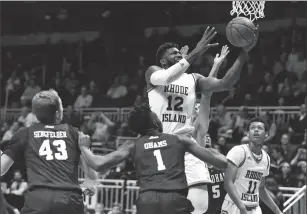  ?? File photo by Jerry Silberman / risportsph­oto.com ?? URI forward Hassan Martin (12) finished his career with 317 blocks, which is the second most in program history. Martin also finished with 1,300 points and 784 rebounds.