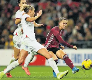  ??  ?? NEW RECORD, SAME OLD SONG Klara Buhl’s late winner in front of biggest England crowd