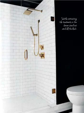  ??  ?? Subtle contrastin­g tile treatments in the shower stand out amid all the black.