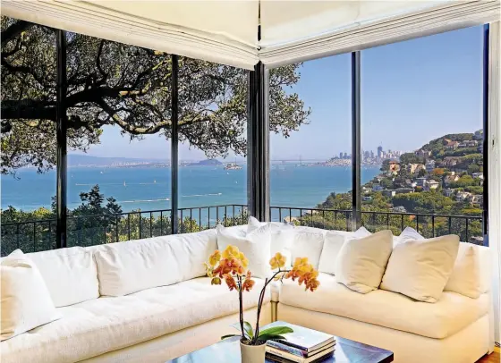  ?? Jasonwells/golden Gate Creative ?? 54 Lower Crescent Ave. in Sausalito features walls of glass that frame views of downtown San Francisco.