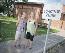  ?? GAVIN YOUNG ?? Children participat­ing in a special-needs summer camp run by Naomi Stiglic, left, and Lois Petersen were left waiting for hours after problems with Calgary Transit Access service.