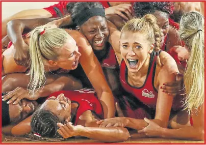  ??  ?? IT’S A PILE-ON! England celebrate after Helen Housby, looking at the camera, scored the winning goal