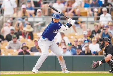  ?? Associated Press ?? In the box: Los Angeles Dodgers designated hitter Shohei Ohtani waits for a pitch during the second inning of a spring training baseball game against the Chicago White Sox Wednesday in Phoenix.