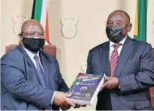 ?? ?? COMMISSION chairperso­n Acting Chief Justice Raymond Zondo handed over the first part of the State Capture report to President Cyril Ramaphosa in Pretoria on Wednesday. | KOPANO TLAPE GCIS