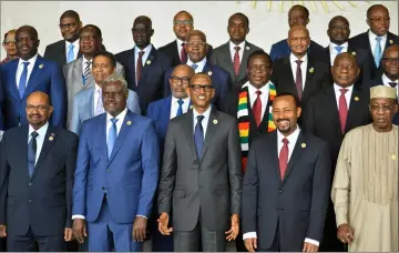  ??  ?? Africa Union Commission chairperso­n Moussa Faki Mahamat (second left front row) poses for a family photo with Africa’s Presidents (from left) Sudan’s Omar al-Bashir, Kagame, Ethiopia’s Prime Minister Abiy Ahamed and Chad’s Idris Deby on the sidelines of a AU summit in Addis Ababa.— AFP photo