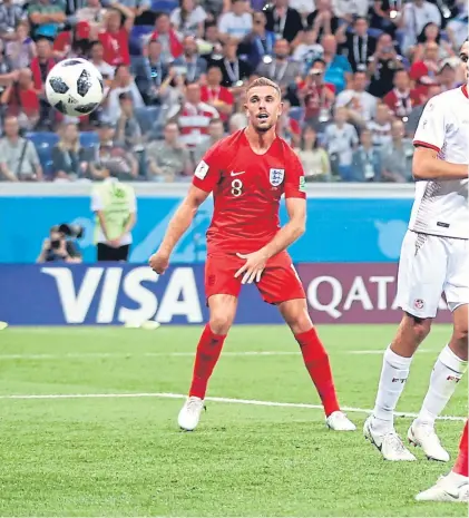  ?? Picture: Getty Images/PA. ?? Above: Harry Kane heads in England’s late winner; below: Ferjani Sassi scores Tunisia’s controvers­ial equaliser from the penalty spot.