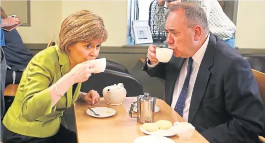  ??  ?? Tea for two – but it’s left a sour aftertaste for the SNP’s Nicola Sturgeon and Alex Salmond, who once looked like the political dream team