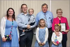  ?? PILOT PHOTO/JAMES MASTER ?? County Council Member Penny Lukenbill (right) was awarded the 2020 Arthur R. Himsel Award at Monday’s County Council meeting. Pictured with her is her family.