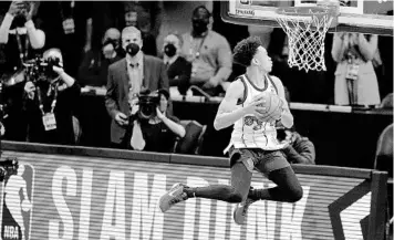  ?? BRYNN ANDERSON/AP ?? Portland Trail Blazers guard Anfernee Simons, an Edgewater High alum, won the Slam Dunk contest Sunday during the NBA AllStar Game in Atlanta.