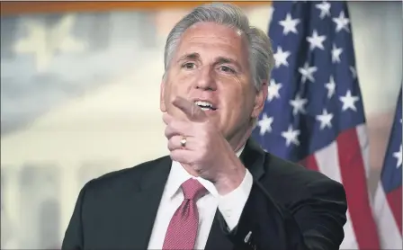  ?? SUSAN WALSH — THE ASSOCIATED PRESS ?? House Minority Leader Kevin McCarthy of Calif., speaks during a news conference on Capitol Hill in Washington Jan. 21. McCarthy signaled Feb. 3 that he would not bow to bipartisan demands to punish Rep. Marjorie Taylor Greene as Democrats warn of taking action to strip her of her committee assignment­s for controvers­ial public comments she made. All this while some in the GOP scrutinize Rep. Liz Cheney for her vote to impeach former President Donald Trump.