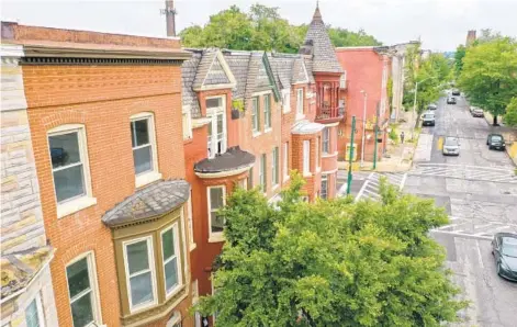  ?? JERRY JACKSON/BALTIMORE SUN ?? A recently rehabbed home is seen along Druid Hill Avenue in Baltimore’s Upton neighborho­od.