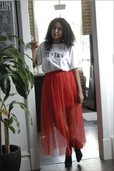  ?? PHOTOGRAPH­Y BY SHERYL NADLER ?? “I like quirky pieces, some things a bit retro. I guess that’s where the hippie comes in – I like to pair retro pieces with modern pieces. And I like to pair edgy things with girlie things,” says Nicole Alexander, who pairs an oversized tee from...