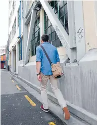  ?? Photo: KEVIN STENT/ FAIRFAX NZ ?? Outer skeleton: This Lukes Lane building has used an exoskeleto­n for its earthquake strengthen­ing. Wellington City Council is developing guidelines to limit which buildings can use the increasing­ly popular method, as it can encroach into public space.