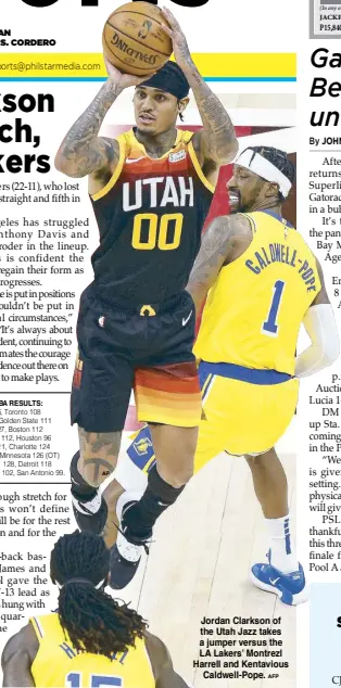  ?? AFP ?? Jordan Clarkson of the Utah Jazz takes a jumper versus the LA Lakers’ Montrezl Harrell and Kentavious Caldwell-Pope.