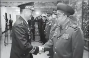  ??  ?? ROK Major General Kim Do-gyun and DPRK Lieutenant General An Ik-san meet at the border village of Panmunjom on Friday.