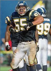  ?? ASSOCIATED PRESS 1996 ?? In 1996, Junior Seau celebrates a sack in the fourth quarter of the Chargers’ victory over the Kansas City. Seau, 43, committed suicide in 2012.