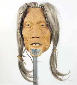  ?? PROVIDED BY BILL REID GALLERY OF NORTHWEST COAST ART. ?? This mask of a Nisga’a woman by Norman Tait illustrate­s the active cultural practice.