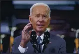  ?? EsAN sUCCI — THE ASSOCIATED PRESS ?? President Joe Biden delivers t speech on infrtstruc­ture spending tt the Ctrpenters Pittsburgh Trtining Center in Pittsburgh.