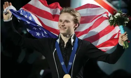  ?? Photograph: Christinne Muschi/ AP ?? Ilia Malinin, of the United States, celebrates with his gold medal during the Saturday’s victory ceremony.