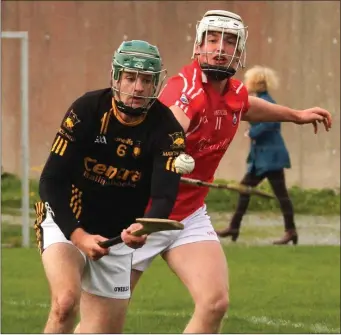  ??  ?? Adamstown centre-back Shane O’Gorman is a step ahead of Fethard’s Ciarán Dwyer.