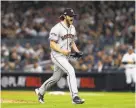  ?? Mike Stobe / Getty Images ?? Astros starter Gerrit Cole scampers off the field after retiring the side in the sixth inning of Game 3.